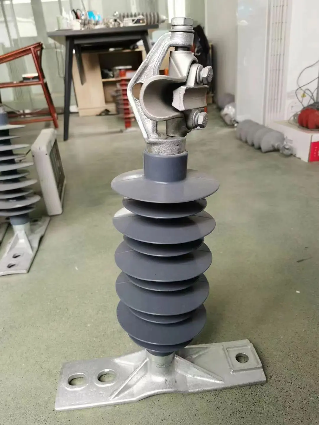 Why are polymer insulator lightning arresters chosen for high-voltage transformers?